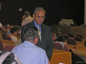 Rakesh Agrawal, the 2008 Founder's Lecturer, mingling with attendees.