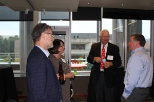 Attendees mingling at 2019 Founder's Day Lecture.